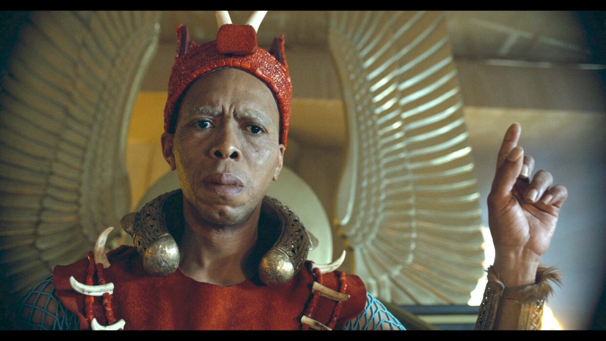 Mothusi Magano as King Letsha in Blood Psalms. Episode 5, in the Assembly in full regalia. 