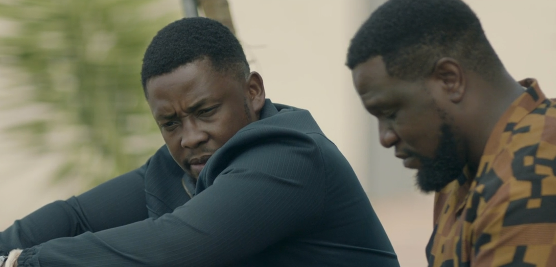 Mqhele comforting his brother Sambulo in The Wife