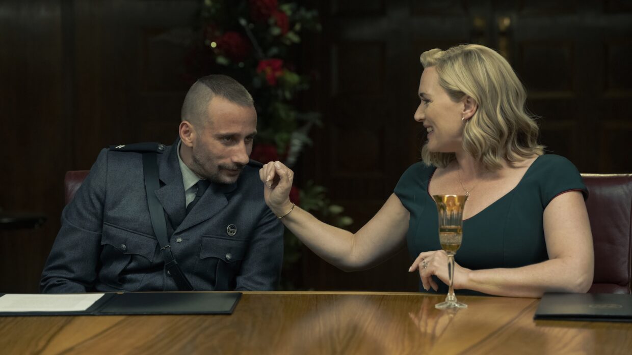 Matthias Schoenaerts as Corporal Herbert “Butcher” Zubak and Kate Winslet as Chancellor Elena Vernham in The Regime S1 on Showmax