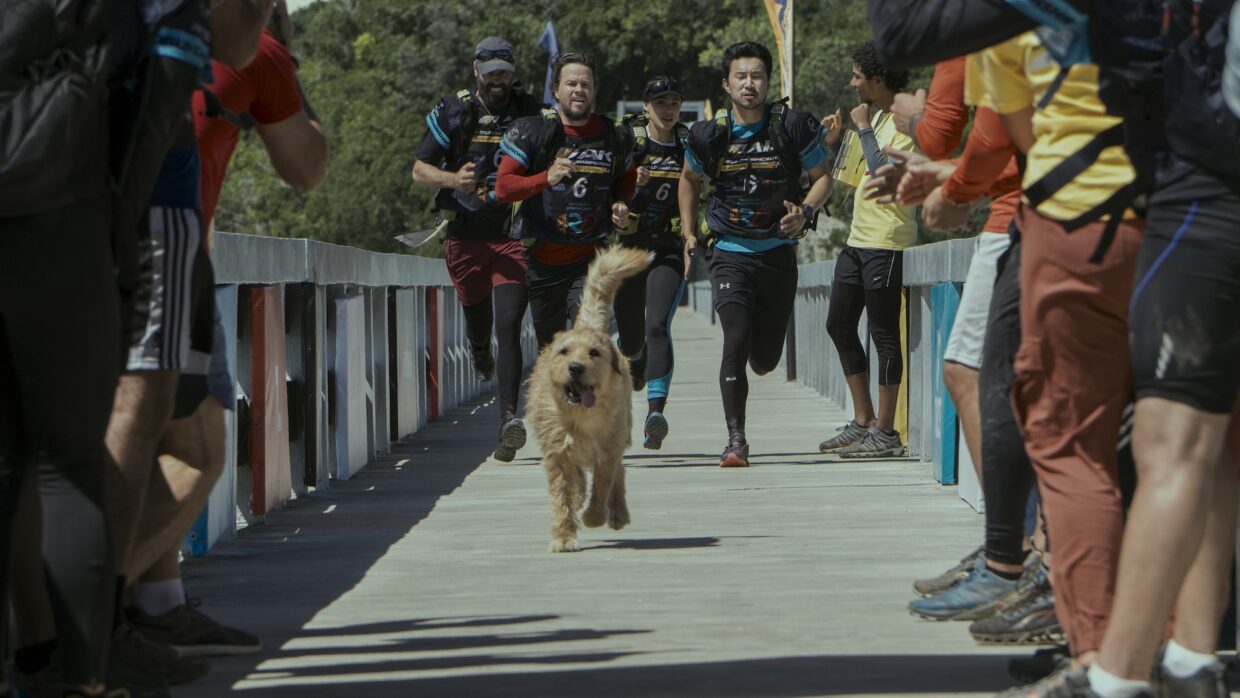 Ali Suliman as Chik, Mark Wahlberg as Michael, Nathalie Emmanuel as Olivia and Simu Liu as Leo in Arthur The King.